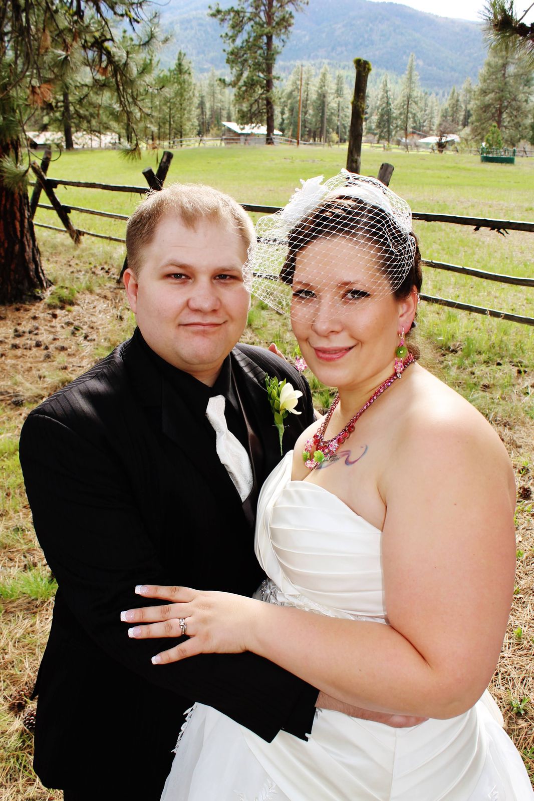 Smiling couple in a close outdoor portrait